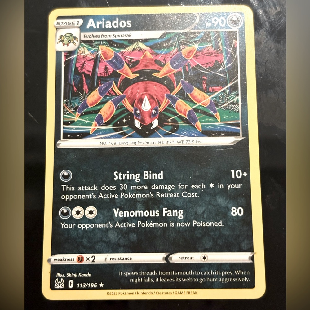 Ariados non holographic Pokémon card.